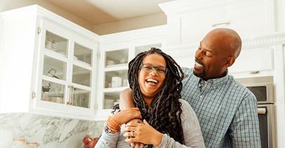 couple-embracing-in-the-kitchen