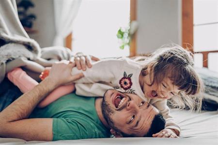 dad-and-toddler-playing-and-laughing