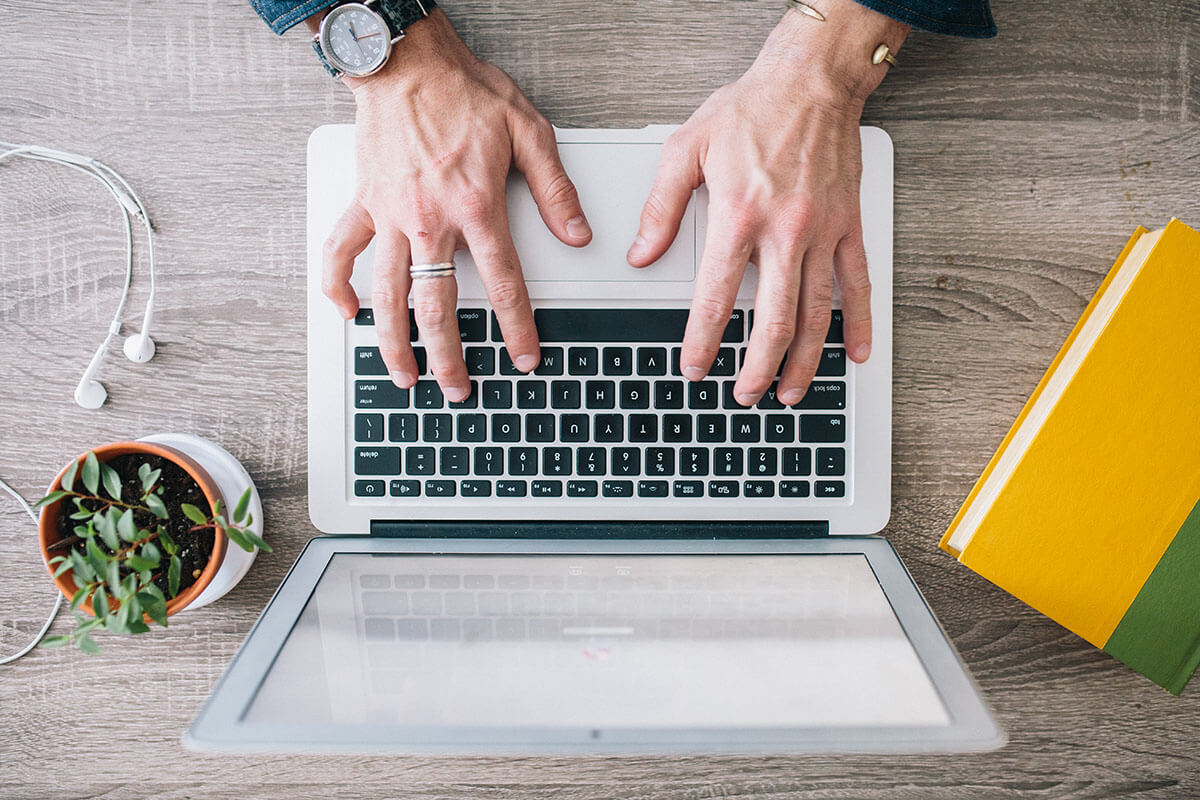 hands-typing-on-laptop-computer